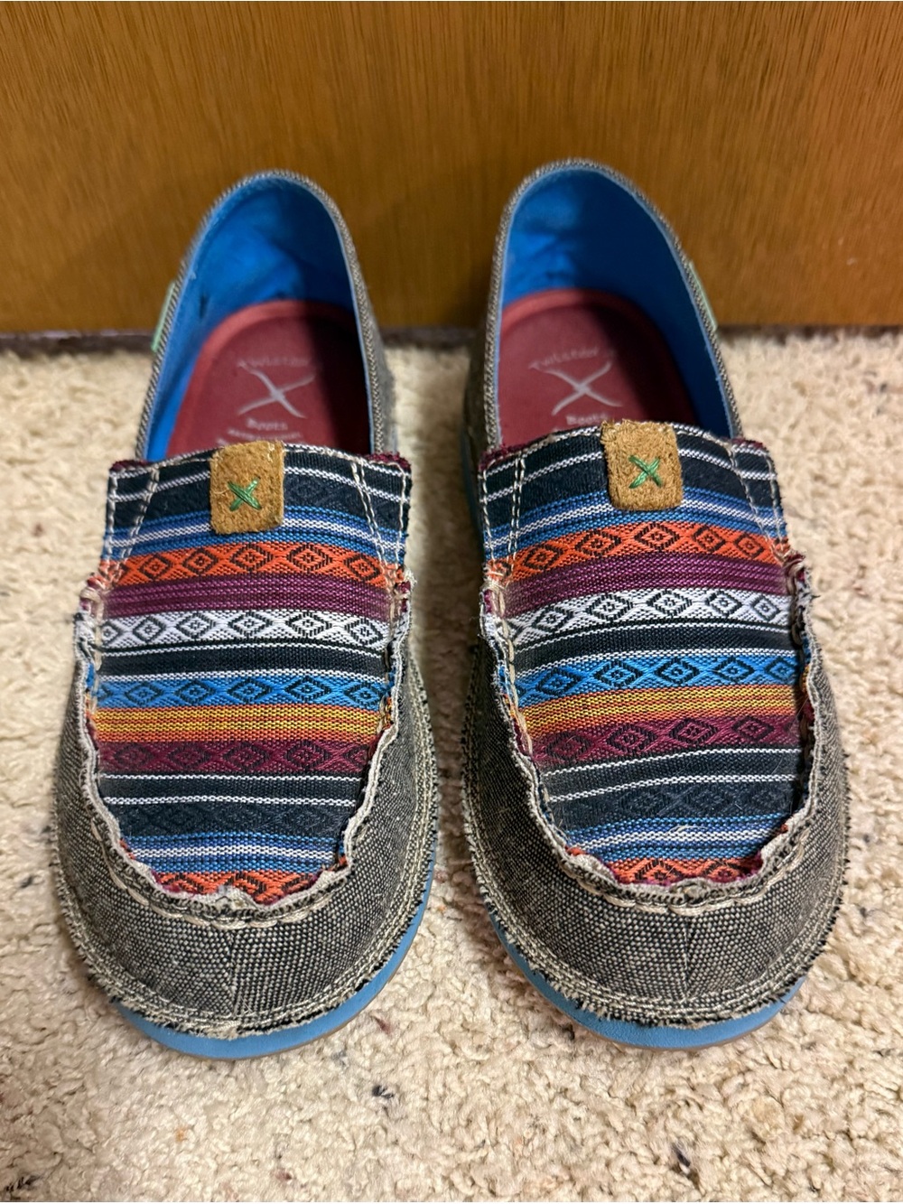 Twisted X slip ons